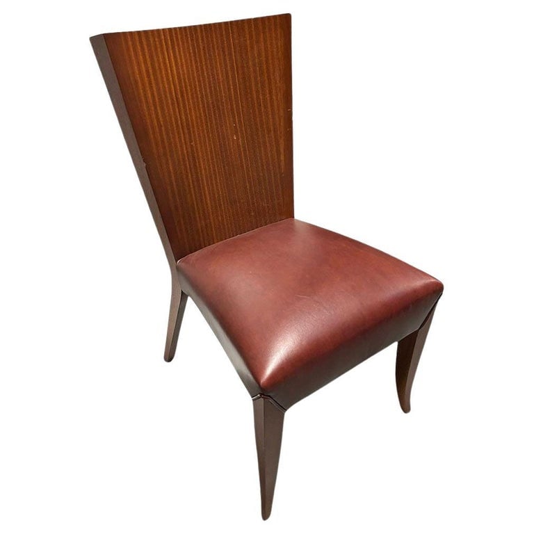Dakota Jackson "Aldabhra" Sculptural Leather Side Chair: Dakota Jackson's "Aldabhra" Side Chair with sculptural beauty is found at the intersection of the back and the leg, as the wood contours in two directions simultaneously. The solid wood leg extends