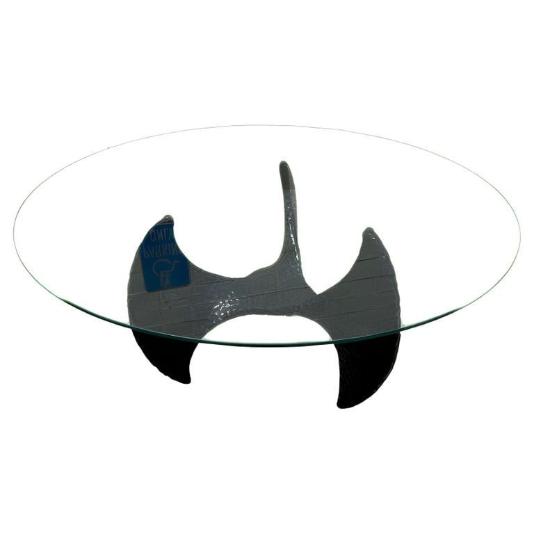 Brutalist Resin Coffee Table Base by Universal Statuary Corp , 1970: Mid-Century Propeller Coffee table made by the Universal Statuary Corp, Chicago IL. Cast resin with a black finish. A great late Modern statement piece with a hammered finish and a Brutalist form. Thi