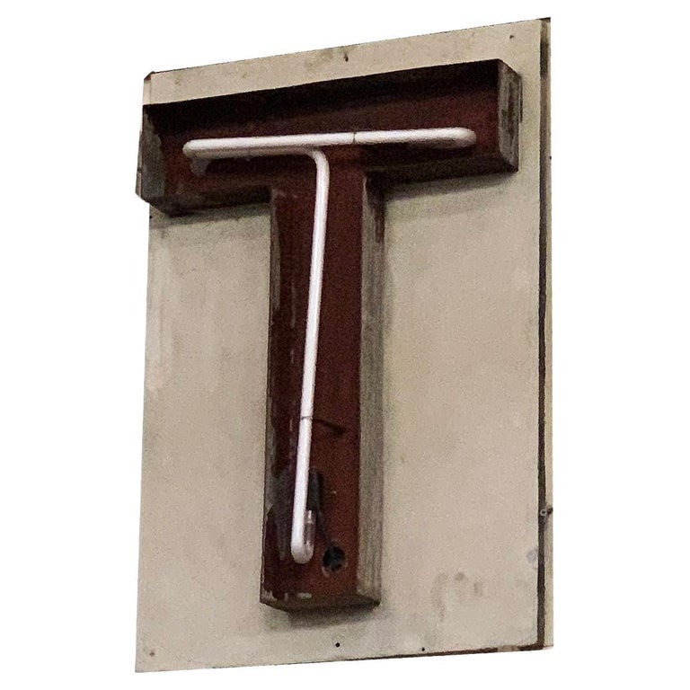 Large Vintage Neon Marquee Letter "T" From Pan American Auditorium: Own a piece of Los Angeles history. This large neon marquee letter "T" comes from the interior of the iconic Pan-Pacific Auditorium in Los Angeles and was removed in 1986. Each letter features the sam