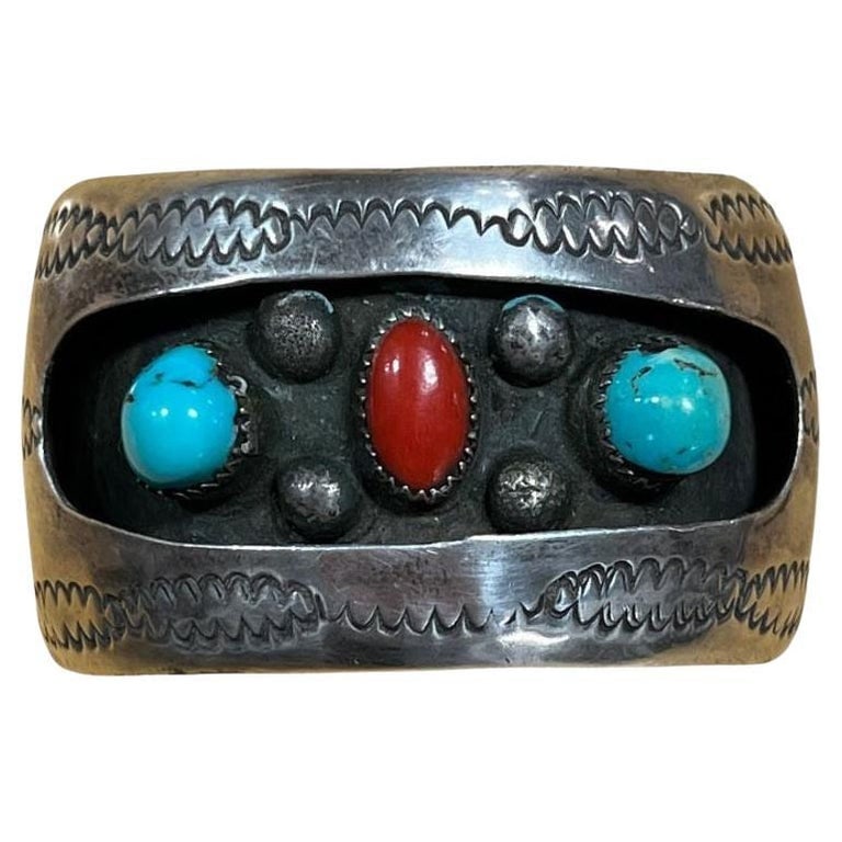 Vintage Navajo KY Sterling Silver Turquoise Coral Cuff Bracelet: 1970 South West Navajo silversmith cuff bracelet, a classic combination of heavy silver and American turquoise and coral stone by jeweler Kathleen Yazzie. The cuff is filled with a magnificent