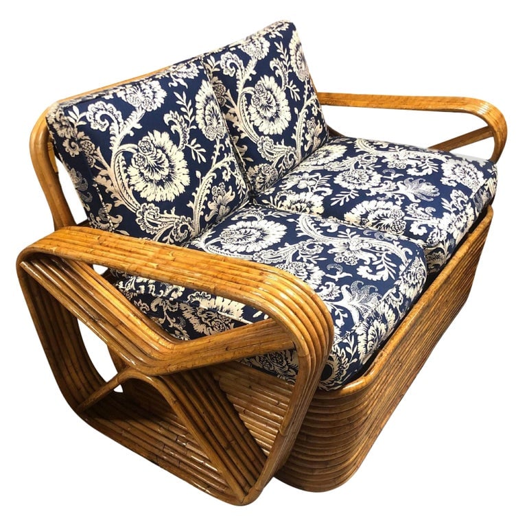 Restored MCM Six-Strand Double Triangle Pretzel Arm Tortoise Shell Rattan Settee: This beautifully restored six-strand double triangle arms, exuding charm with tortoiseshell rattan accents, perfect for classic decor. Tortoiseshell rattan furniture or decor items often feature a