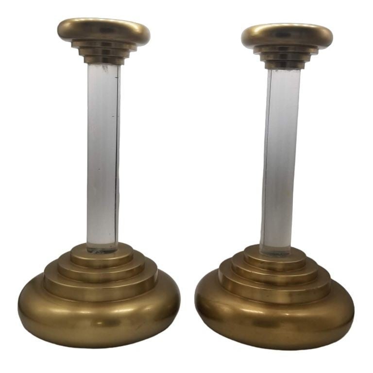 Vintage Candlestick Holders by Charles Hollis jones: The vintage candlestick holder by Charles Hollis Jones seamlessly combines timeless elegance with modern sophistication. Crafted with meticulous attention to detail, this exquisite piece features a