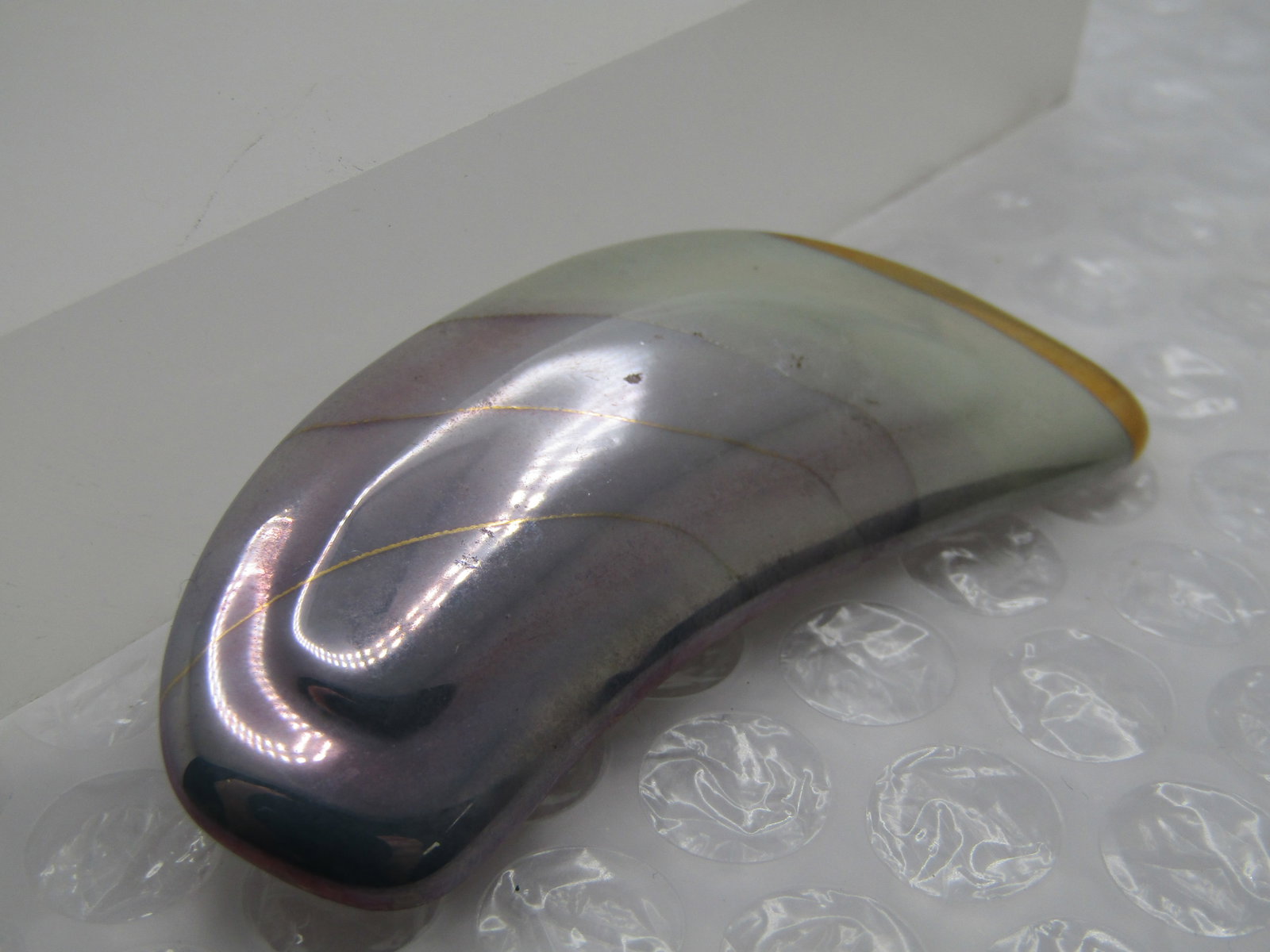 Vintage Lavender and Green Iridescent Ceramic Brooch, 1980's-1990's: Title: Vintage Lavender and Green Iridescent Ceramic Brooch, 1980's-1990's Description: Vintage Lavender and Green Iridescent Ceramic Brooch, 1980's-1990's. This is curved with a tiered center. It has