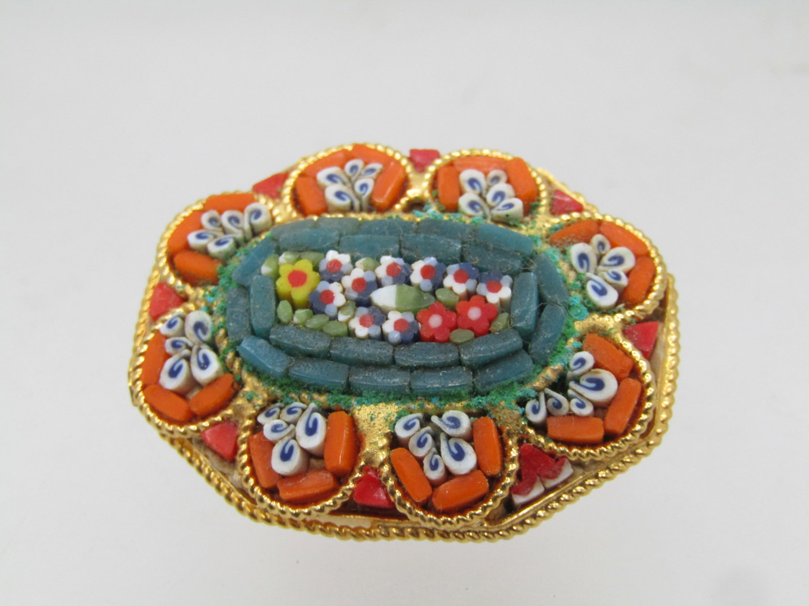 Vintage Micro Mosiac Orange Floral Brooch, Signed J ITALY, 1960's: Title: Vintage Micro Mosiac Orange Floral Brooch, Signed J ITALY, 1960's Description: Vintage Micro Mosiac Orange Floral Brooch, Signed J ALY, 1960's. This has eight angled edges - somewhat more oval