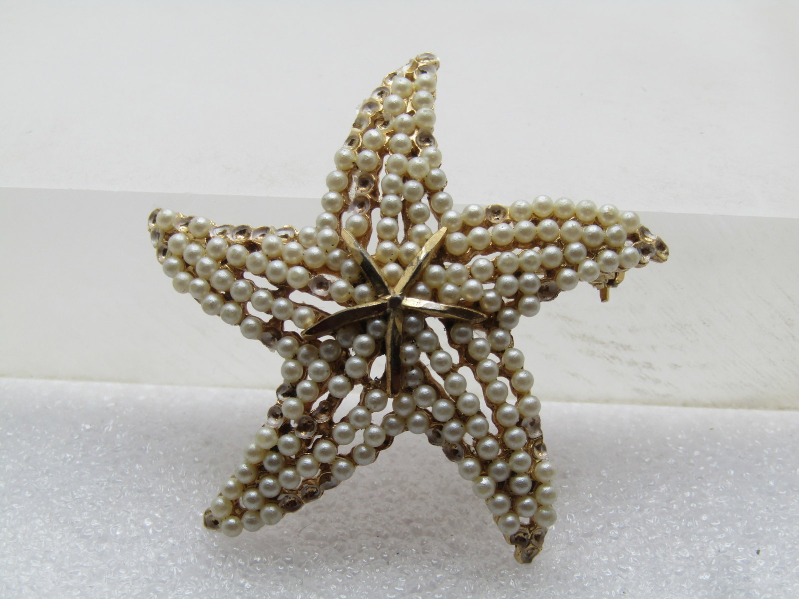 Vintage Faux Pearl Starfish Brooch, Signed BSK, 1960's: Title: Vintage Faux Pearl Starfish Brooch, Signed BSK, 1960's Description: Vintage Faux Pearl Starfish Brooch, Signed BSK, 1960's. Some pearls were missingin the photo but they have been added. Gold t