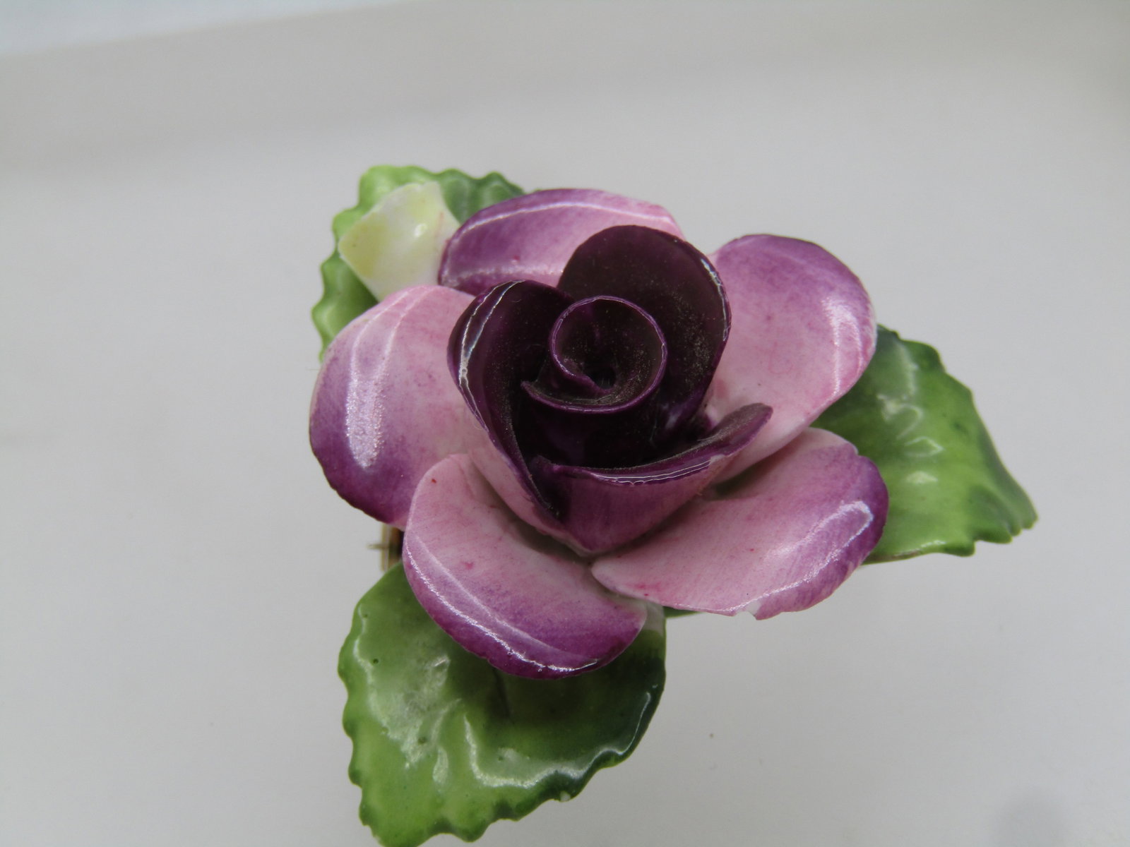 Vintage Porcelain Rose Brooch, England, 1960's, 1.75", Signed: Title: Vintage Porcelain Rose Brooch, England, 1960's, 1.75", Signed Description: Vintage Porcelain Rose Brooch, England, signed Cara China, 1960's, 1.75". Staffordshire England. Pink to purple rose w