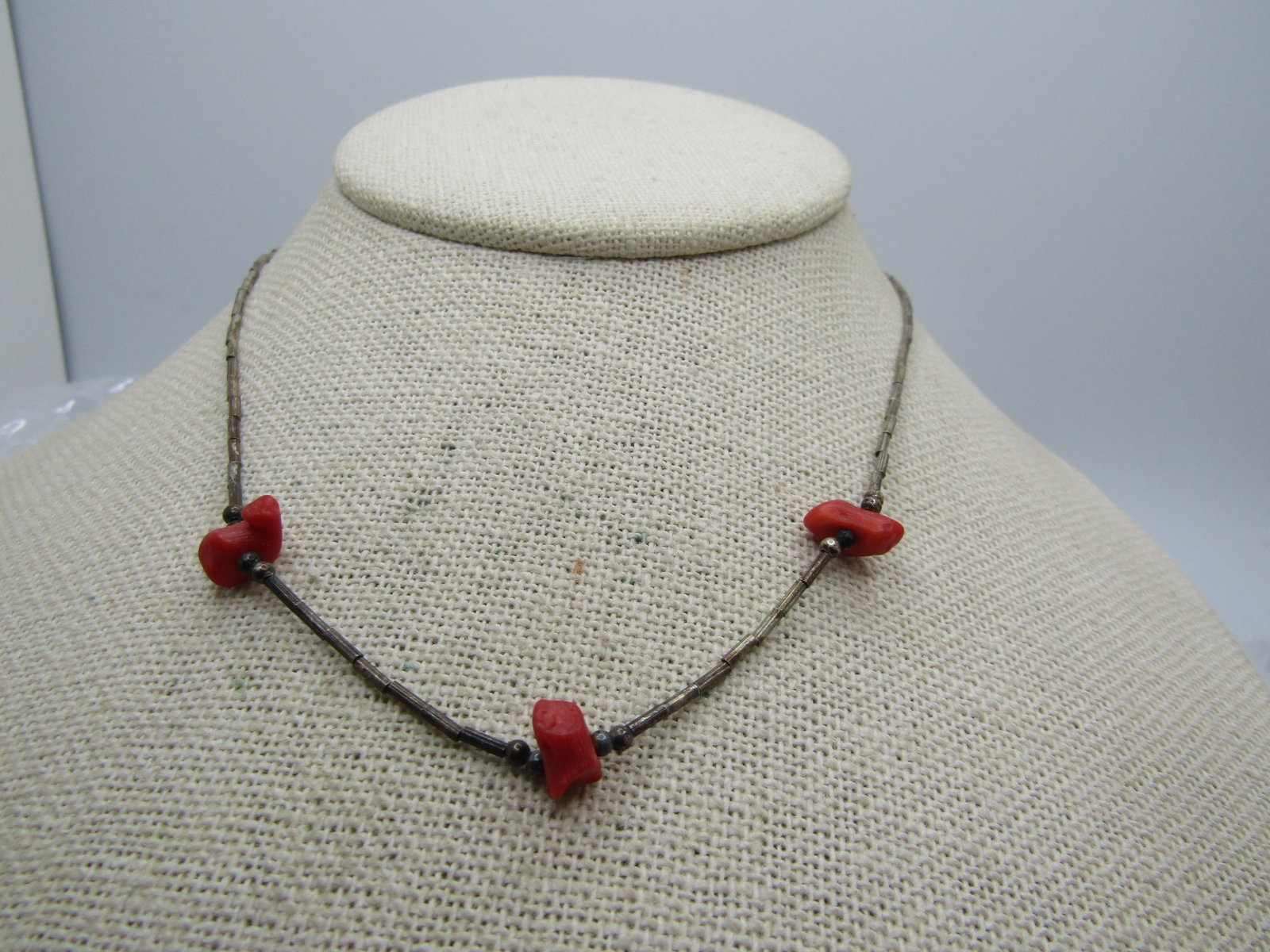 Vintage Silver Southwestern Coral Liquid Silver Necklace, 14": Title: Vintage Silver Southwestern Coral Liquid Silver Necklace, 14" Description: Vintage Silver Southwestern Coral Liquid Silver Necklace, 14". Three red coral nuggets that are appx. 1/4" with liquid