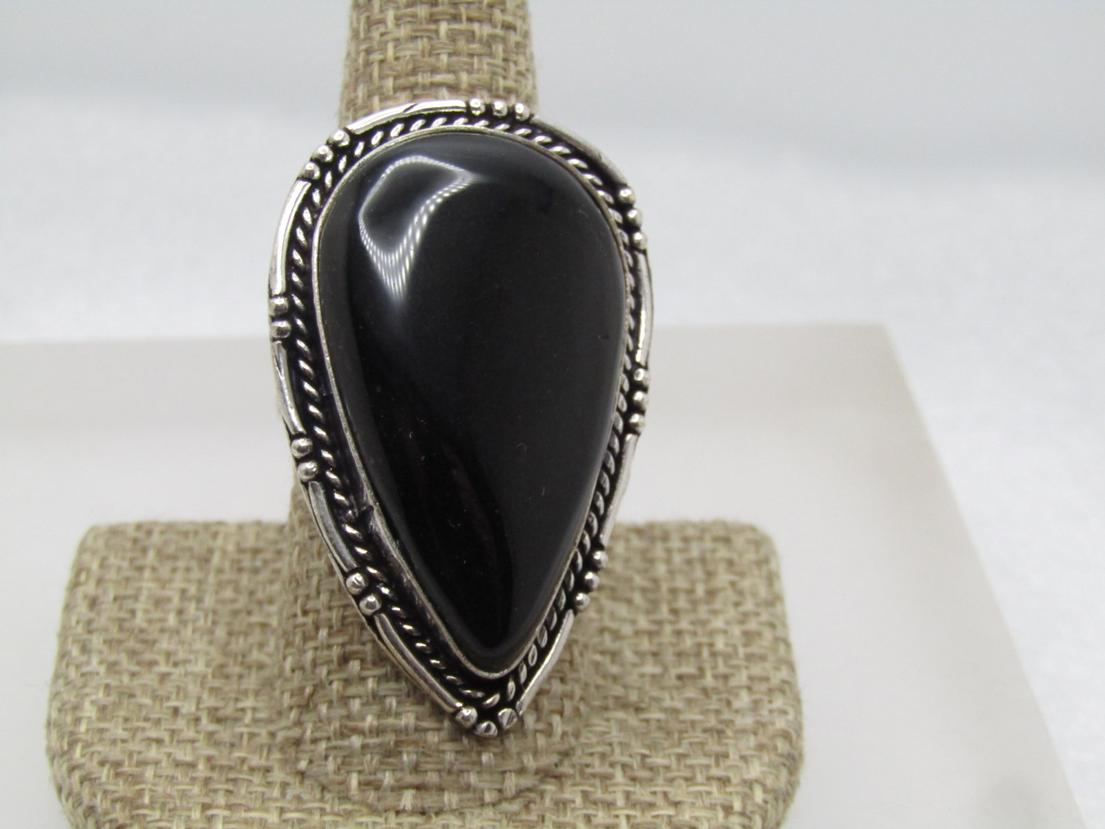 Southwestern Black Onyx Statement Ring, Sz. 10, Modern: Title: Southwestern Black Onyx Statement Ring, Sz. 10, Modern Description: Southwestern Black Onyx Statement Ring, Sz. 10, Modern 2000-2020's. This has a lare pear-shaped stone that tests as onyx. It 