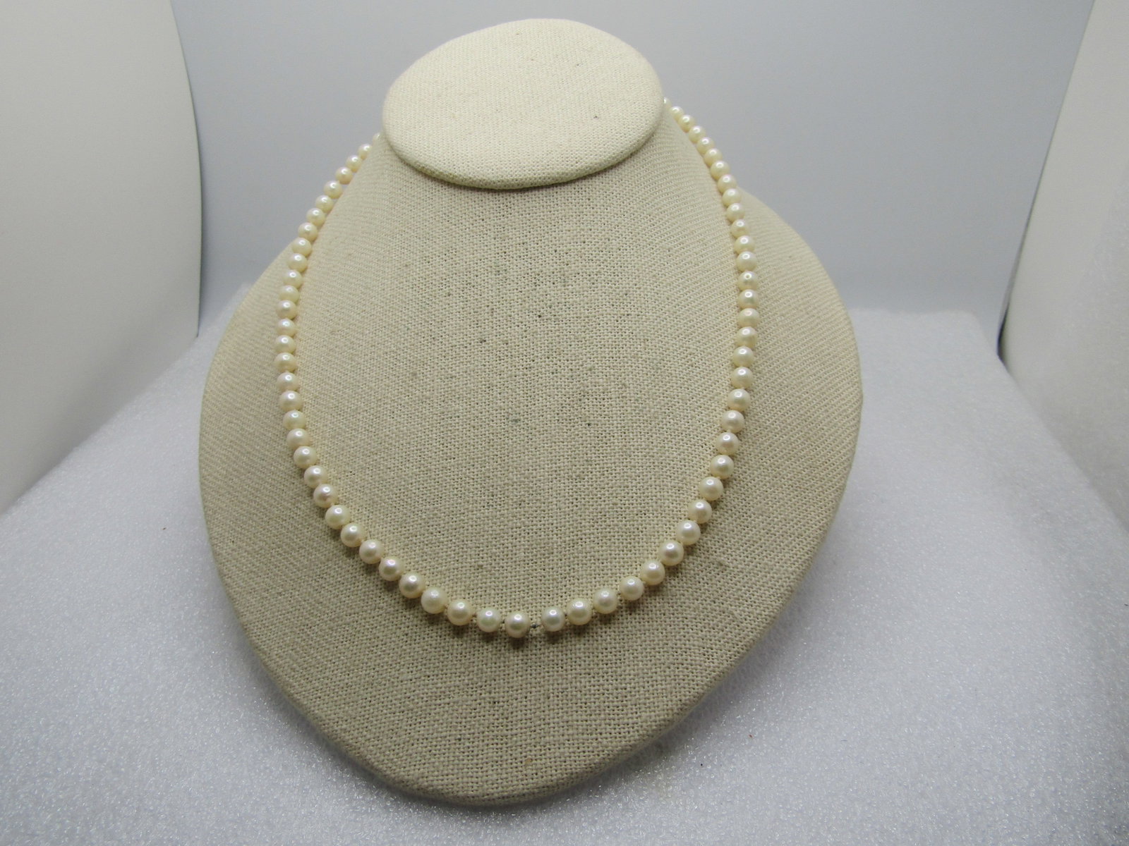 Vintage 5mm Faux Pearl Necklace, 18", 1960's-1970's,: Title: Vintage 5mm Faux Pearl Necklace, 18", 1960's-1970's, Description: Vintage 5mm Faux Pearl Necklace, 18", 1960's-1970's. Gold tone filigree box clasp that is cateye shaped. The pearls are knotted