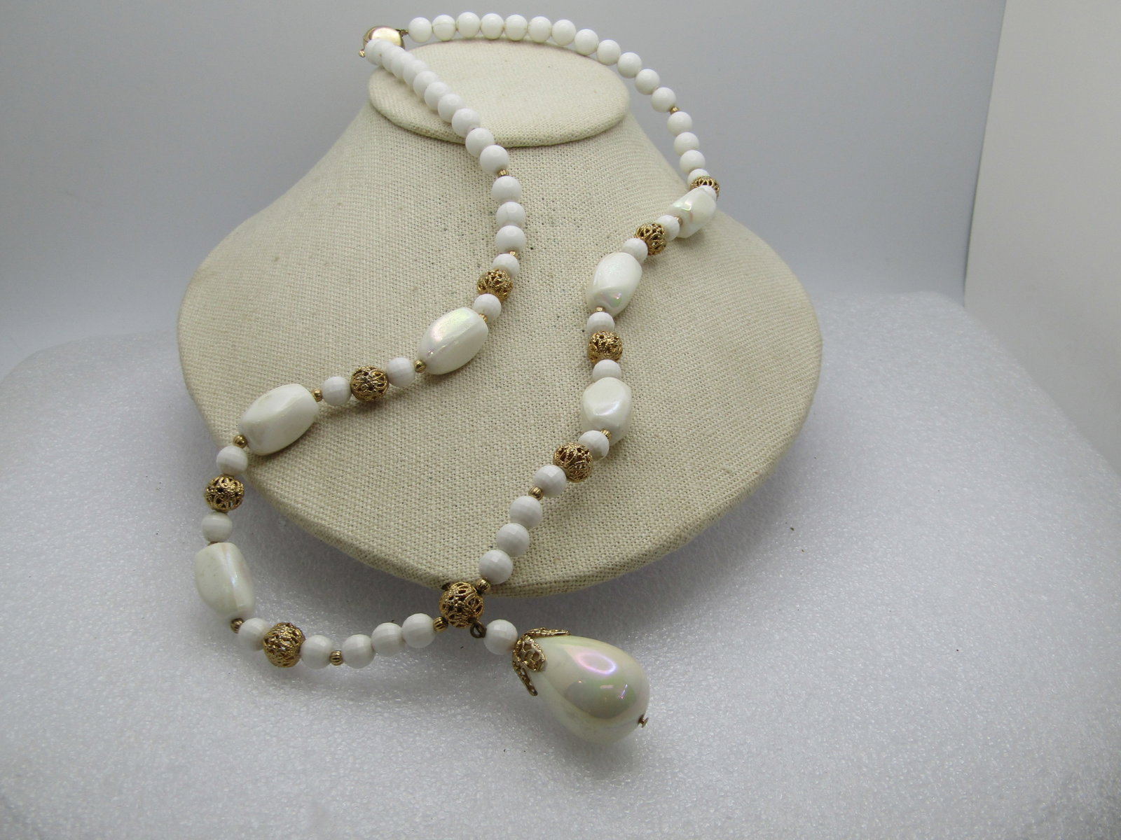 Vintage White and Iridescent Beaded Necklace, 24", 1960's: Title: Vintage White and Iridescent Beaded Necklace, 24", 1960's Description: Vintage White and Iridescent Beaded Necklace, 24", 1960's. This has an iridescent teardrop bead at front center that is ap
