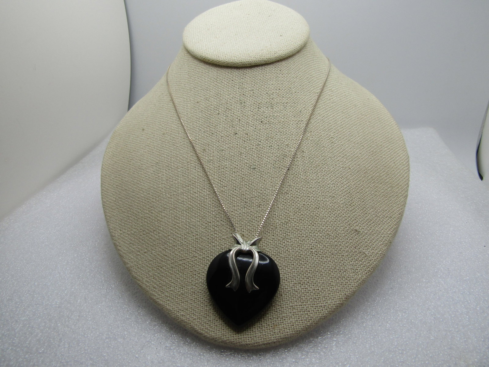 Vintage Sterling Black Onyx Heart Ribbon Necklace, 24". 1980's-1990's: Title: Vintage Sterling Black Onyx Heart Ribbon Necklace, 24". 1980's-1990's Description: Vintage Sterling Black Heart Ribbon Necklace, 24". 1980's-1990's. The pendant is a black onyx puffy heart