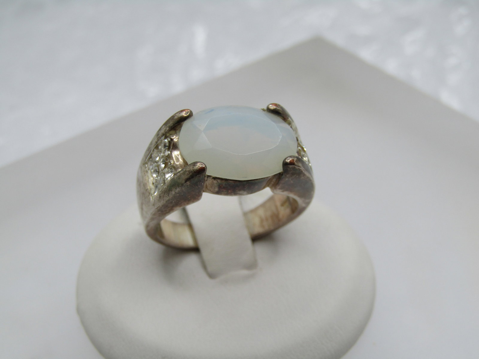 Vintage Silver Plated Faux Opal CZ Ring, Sz. 8.5. 1980's-1990's: Title: Vintage Silver Plated Faux Opal CZ Ring, Sz. 8.5. 1980's-1990's Description: Vintage Silver Plated Faux Opal CZ Ring, Sz. 8.5. 1980's-1990's. It has an oval glass stone with the faint look of o