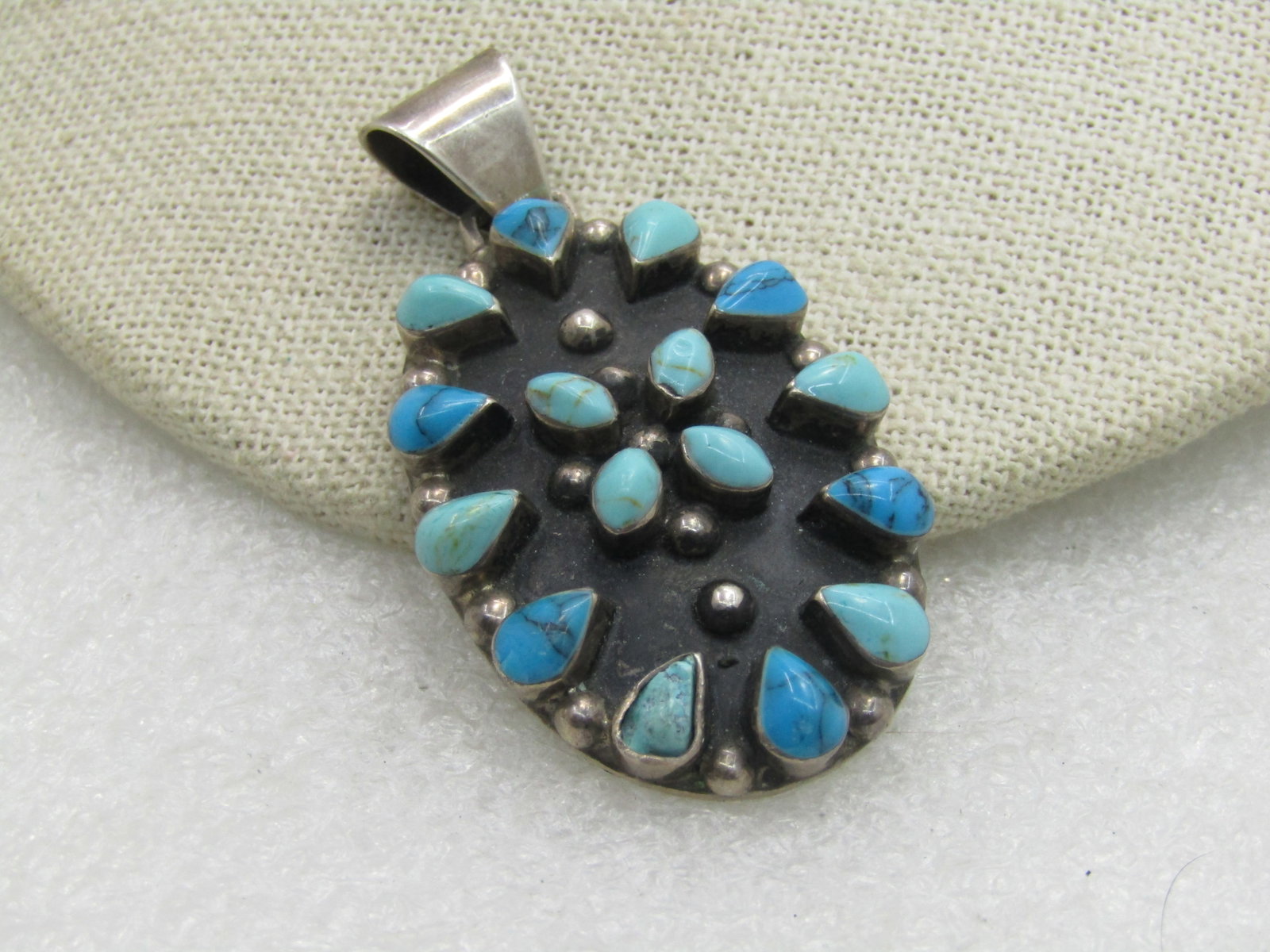 Vintage Sterling Silver Southwestern Turquoise Pendant, 2.25": Title: Vintage Sterling Silver Southwestern Turquoise Pendant, 2.25" Description: Vintage Sterling Silver Southwestern Turquoise Pendant, 2.25" tall and appx 1.25" across the oval with darker and