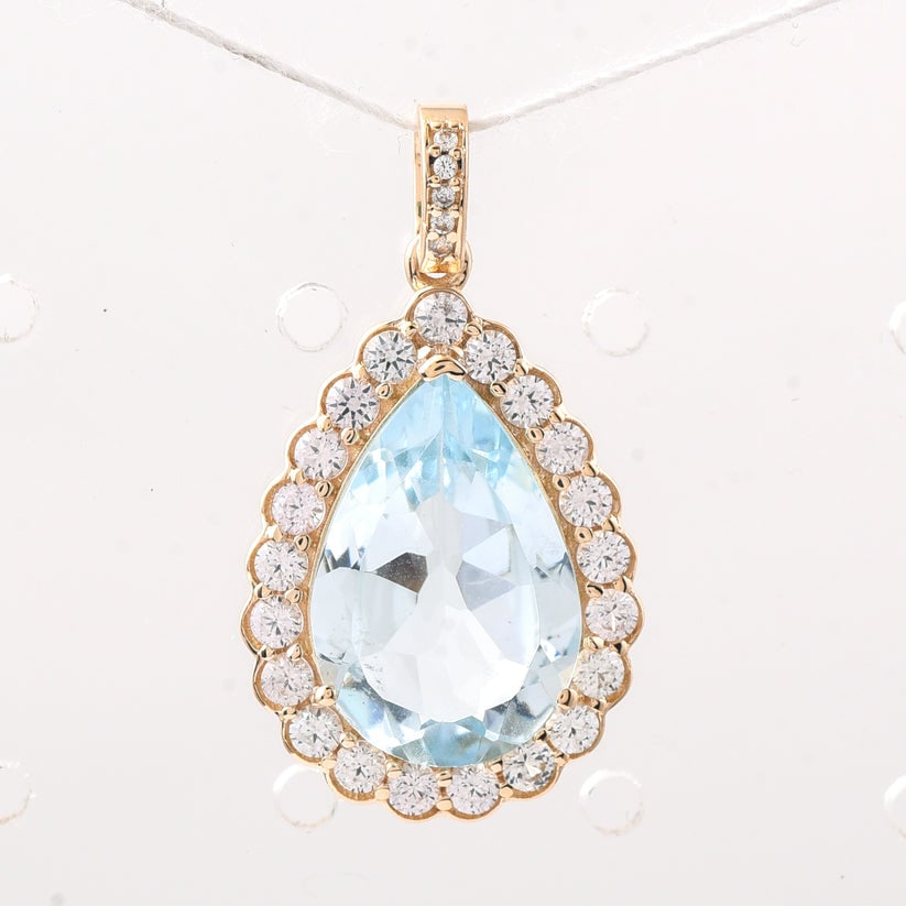4.95 Ct Pear Aquamarine 9K Gold Pendant: 4.95 Total Carat Aquamarine 9K Gold Pendant Specifications: Total Weight 2.234 g Center Gemstone Aquamarine Gemstone Carat Weight 4 Carats Gemstone Measurements 15.10X10.10X5.20 mm Additional Gemstone