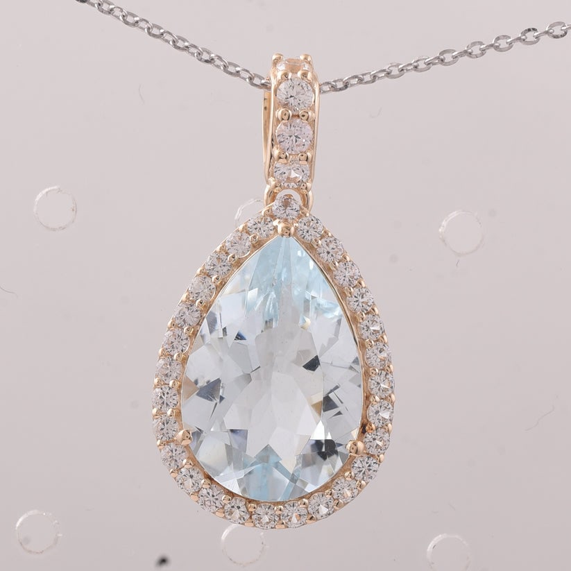5.49 Ct Pear Aquamarine 9K Gold Pendant: 5.49 Total Carat Aquamarine 9K Gold Pendant Specifications: Total Weight 2.209 g Center Gemstone Aquamarine Gemstone Carat Weight 4.8 Carats Gemstone Measurements 15.10X10.20X6 mm Additional Gemstones