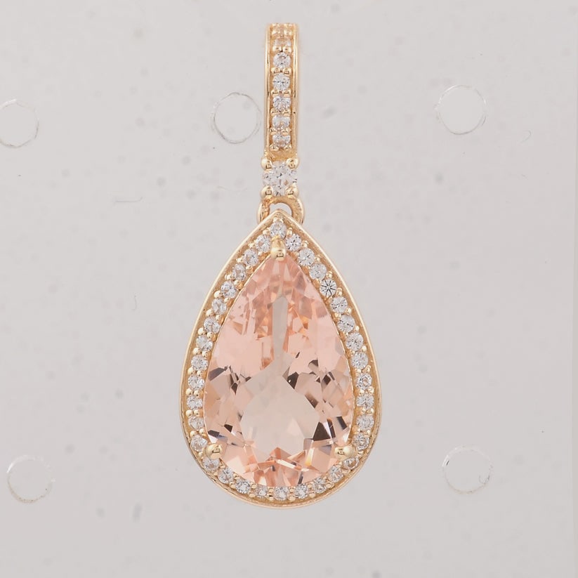 2.81 Ct Pear Morganite 9K Gold Pendant: 2.81 Total Carat Morganite 9K Gold Pendant Specifications: Total Weight 1.87 g Center Gemstone Morganite Gemstone Measurements 12X8X4.90 mm Additional Gemstones White Sapphire Additional Gemstone Weig