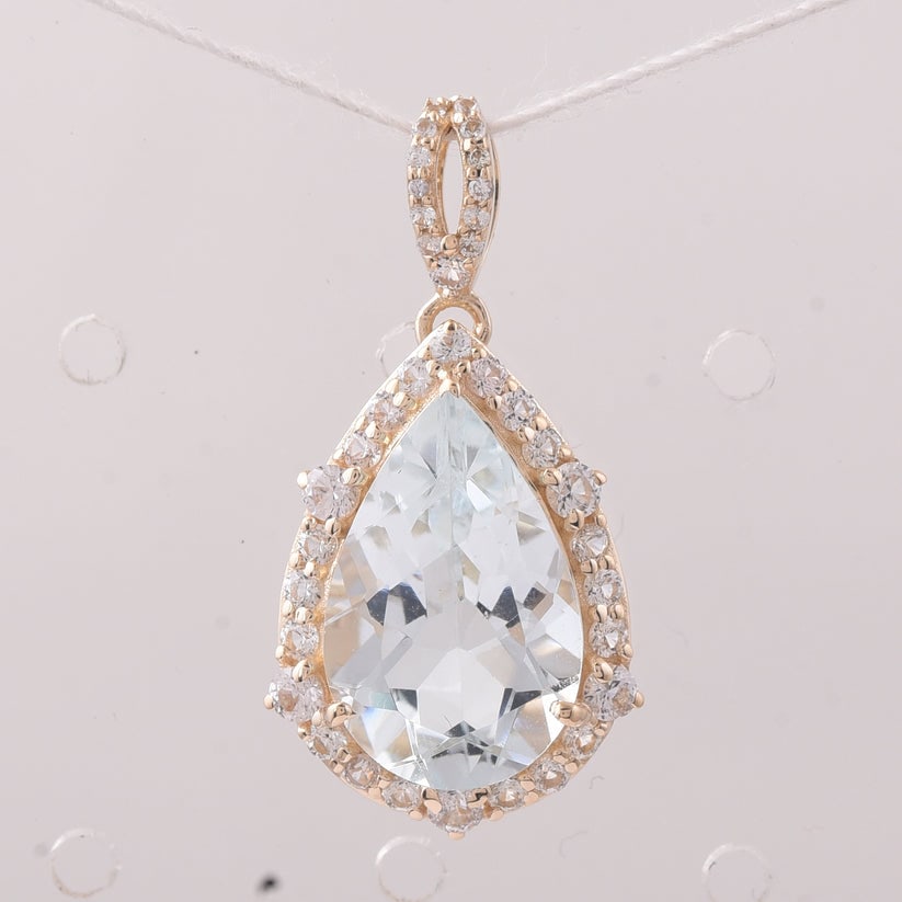 4.38 Ct Pear Aquamarine 9K Gold Pendant: 4.38 Total Carat Aquamarine 9K Gold Pendant Specifications: Total Weight 2.136 g Center Gemstone Aquamarine Gemstone Carat Weight 3.76 Carats Gemstone Measurements 14.20X9.20X6 mm Additional