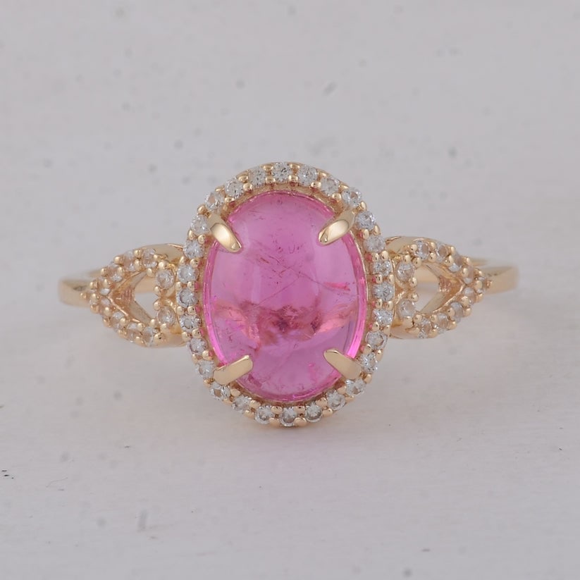 2.52 Ct Oval Tourmaline 9K Gold Ring: 2.52 Total Carat Tourmaline 9K Gold Ring Specifications: Total Weight 2.12 g Center Gemstone Tourmaline Gemstone Carat Weight 2.3 Carats Gemstone Measurements 9X7X4.20 mm Additional Gemstones White