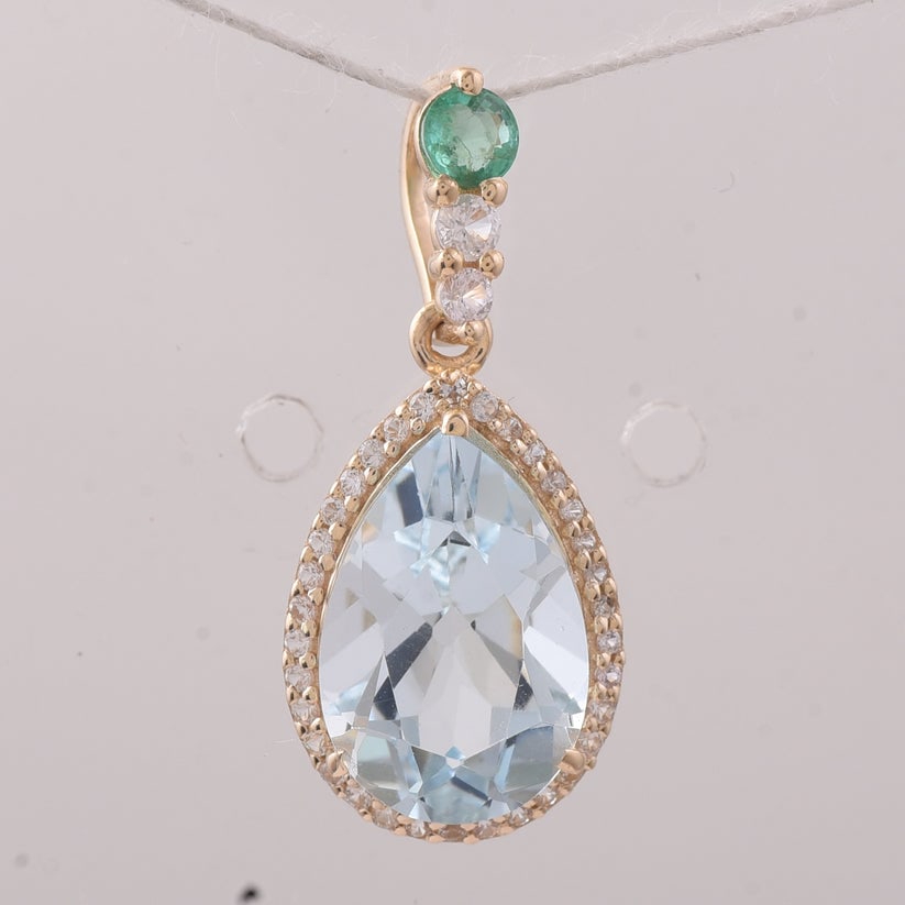3.35 Ct Pear Aquamarine 9K Gold Pendant: 3.35 Total Carat Aquamarine 9K Gold Pendant Specifications: Total Weight 1.382 g Center Gemstone Aquamarine Gemstone Carat Weight 3.03 Carats Gemstone Measurements 12X8X6.10 mm Additional Gemstones