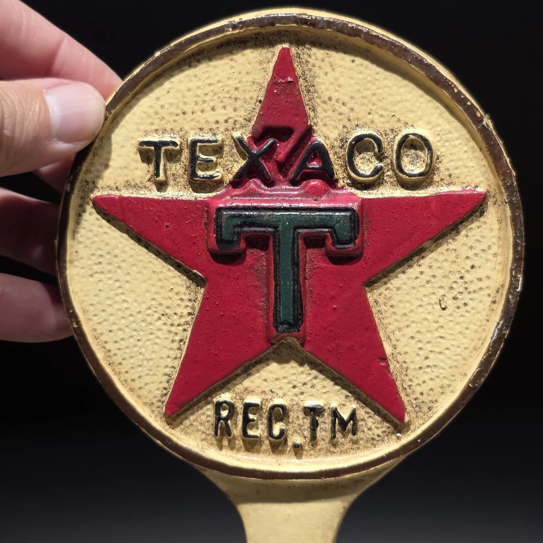 9.5" Texaco Cast Iron Doorstop Lollipop Sign Base Advertising: 9 1/2" Tall This is a heavy, cast iron Texaco "lollipop" reproduction sign base, highly popular today for use as a decorative doorstop. It features the iconic "Texaco" script in embossed lettering. Wh