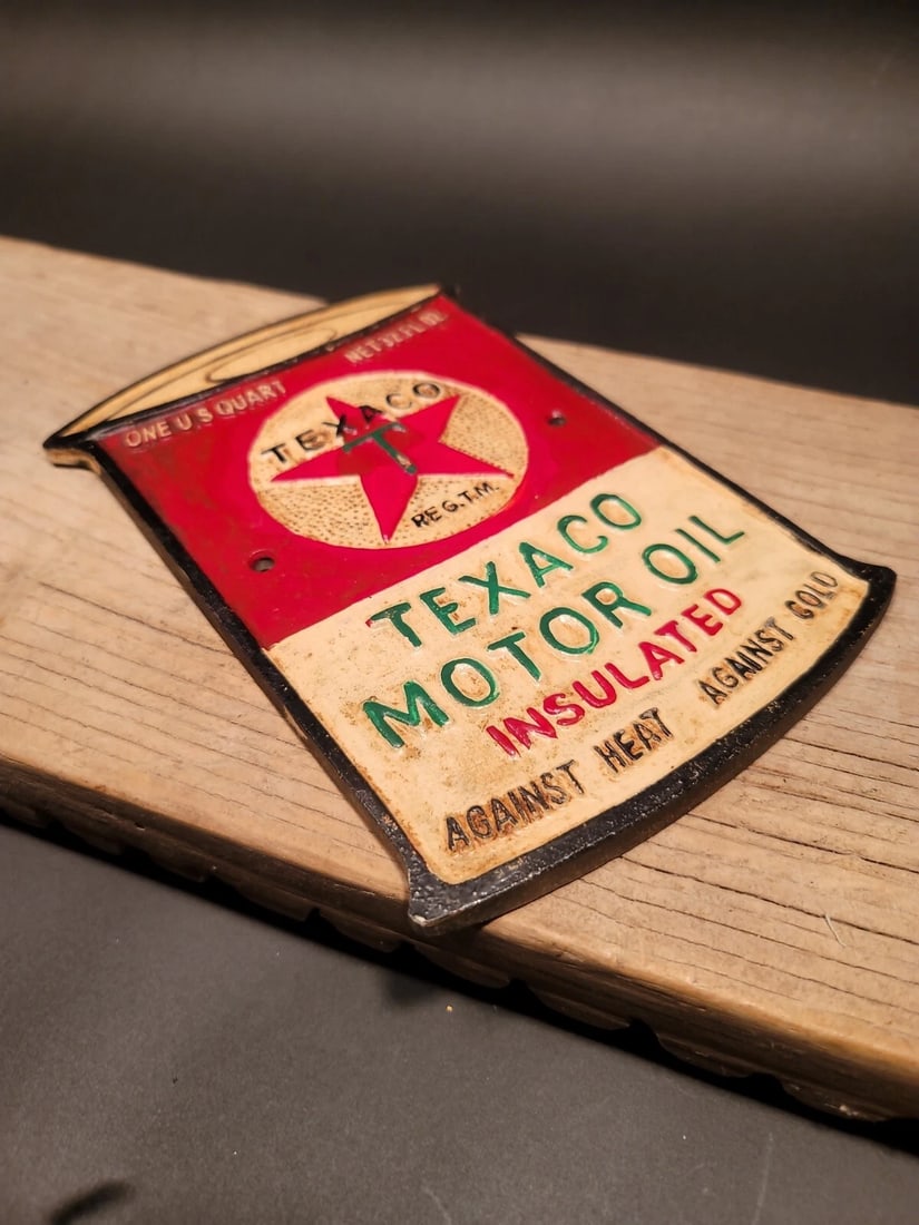Cast Iron Texaco Gas Oil Sign Plaque: 8 1/8 Tall x 5 3/4" Wide Such a neat reproduction cast iron plaque/sign. This sign is all solid cast iron. Hand painted, wonderful signs of wear and distress. Hard to tell its age! Reserve: $30.00