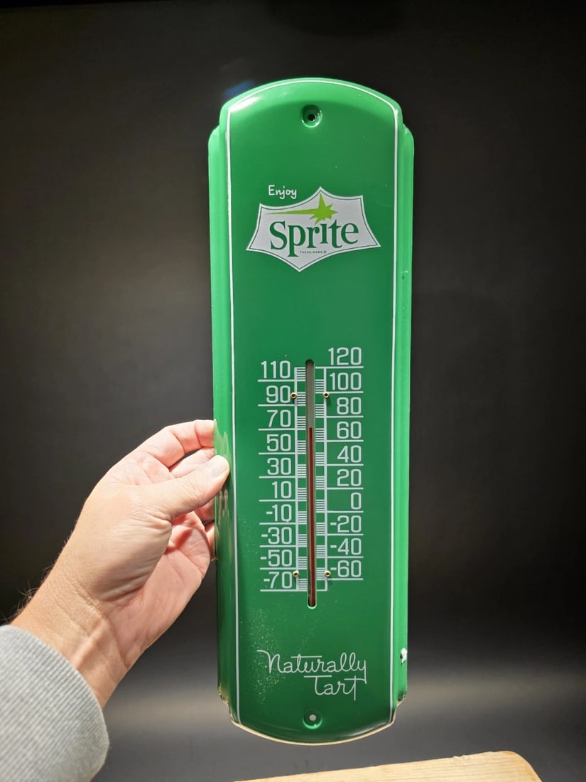17 "Classic Vintage Style Sprite Soda Metal Thermometer Sign: 17" Vibrant, vintage-style metal advertising thermometer for Sprite. It features the classic green colorway and the "Naturally Tart" slogan, which was a core part of Sprites marketing campaign during