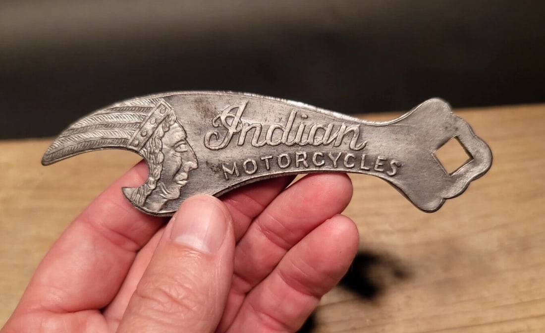 Indian Motorcycles Bottle Opener: 5" long x 1 3/8" Wide A wonderful reproduction collectible Indian Motorcycle advertising bottle opener. Advertising pieces like this many times were given to shops or used. Such a neat piece. Great