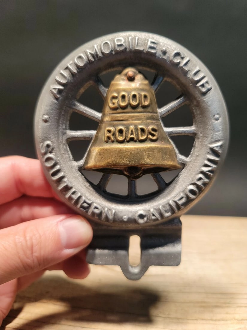 Good Roads Club License Plate Fob Topper: 5" tall x 3 3/4" wide Wonderful reproduction license plate topper. Good detail aluminum, slightly aged to look like an antique. Certainly hard to tell its age. Reserve: $20.00 Shipping: Domestic: