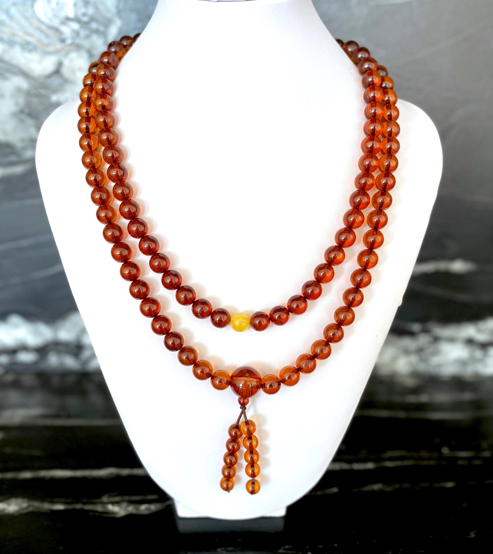 Staggering Vintage Amber Mala made from Round Amber beads: Title:Staggering Vintage Amber Mala made from Round Amber beads Metal:None Gemstone:Amber Weight:49.8 g Size:Size: 9.0 x 9.0 x 720.0 mm Size: 0.354 x 0.354 x 28.346 inches Bead size: 9.0 mm Bead