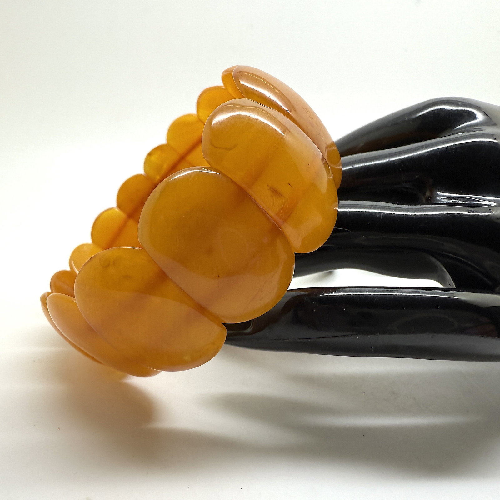 Amazing Vintage Amber Cuff Bracelet: Title:Amazing Vintage Amber Cuff Bracelet Metal:None Gemstone:Whole Stone Weight:18.2 g Size:22x14-27x14mm Made of:(Reconstituted Amber or Whole Stone):Natural Amber Additional information:Amber does 