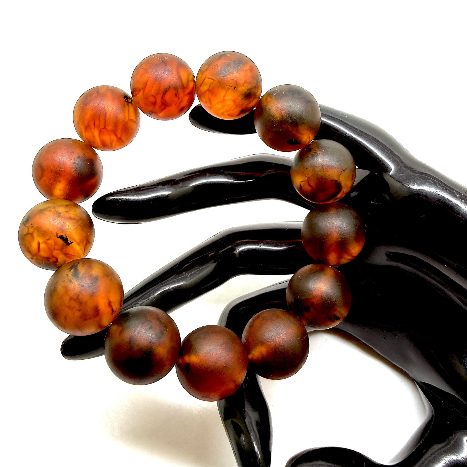 Unique and Exquisite Amber Bracelet made from Round Amber beads: Title:Unique and Exquisite Amber Bracelet made from Round Amber beads Metal:None Gemstone:Amber Weight:31.2 g Size:Bead size: 16.0 mm Bead size: 0.63 inches Made of:(Reconstituted Amber or Whole
