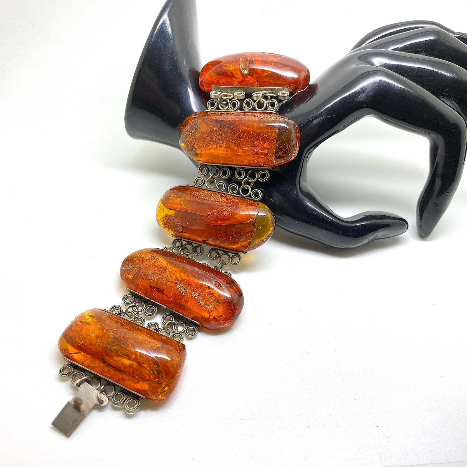 Alluring Amber Bracelet made from Rectangle shaped Amber beads: Title:Alluring Amber Bracelet made from Rectangle shaped Amber beads Metal:None Gemstone:Amber Weight:70.8 g Size:Size: 210.0 x 50.0 x 13.0 mm Size: 8.268 x 1.969 x 0.512 inches Bead size: 21.0 x