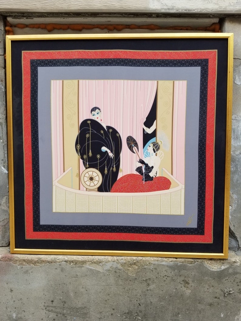 Vintage Framed L 'Opera Signed Silk Scarf By Erte: Vintage Framed L 'Opera Signed Silk Scarf By Erte A Beautiful Piece of Wall Art to Start or Add to an Already Existing High End Luxurious Collection. L'Opera, depicting two ladies, one seated with a p