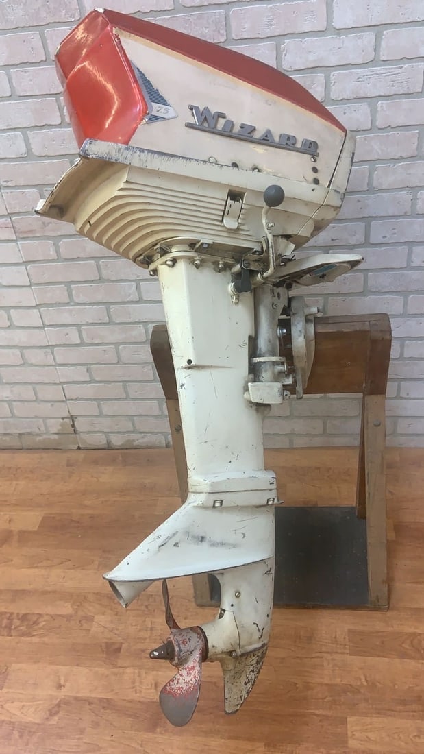 Vintage Wizard Boat Motor: Vintage Wizard 7.5 HP Boat Motor White and red accents, this motor would look perfect mounted on the wall of your lake/ocean house. This piece would also be a perfect gift for fishing enthusiasts.