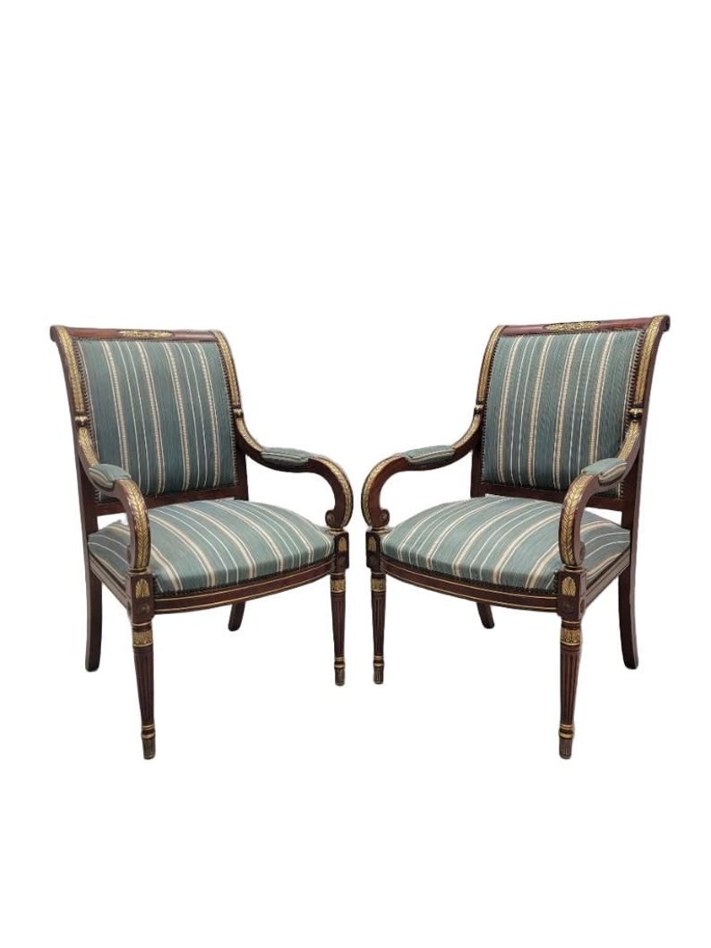 Antique French Empire Style Armchair - Pair: Antique French Empire Mahogany and Gilt Bronze Mounted Armchair in Blue Patterned Stripped Silk Blent - Pair This Antique French Empire armchair set is crafted from rich mahogany wood and adorned with