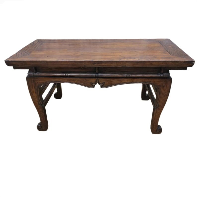 Antique Chinese Elm Coffee Table: Antique Chinese Elm Coffee Table with Original Color and Patina This antique Chinese coffee table is hand carved and has all its original color and patina. A beautiful piece for any living or commerci