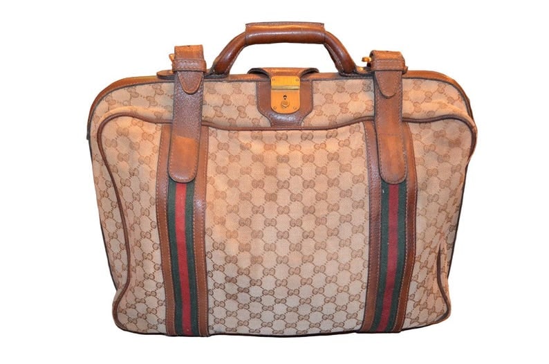 Vintage Gucci Traveling Bag Luggage: Vintage Gucci Traveling Bag Luggage With their original hardware, these vintage Gucci bags would be a stunning statement piece. They feature their characteristic green and red stripes, as well as tan 