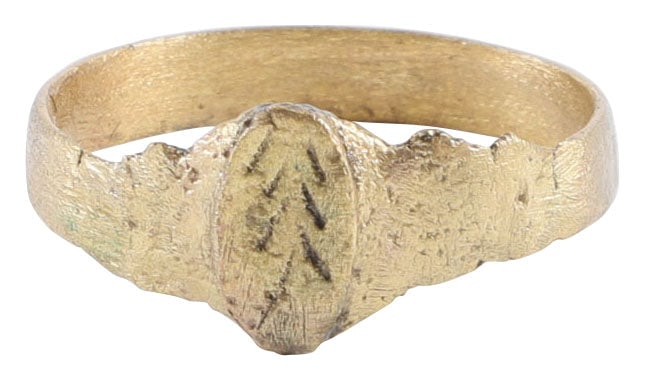 MEDIEVAL ENGLISH MAN'S RING C. 12TH-15TH CENTURY AD, SIZE 11: Gilt bronze, size 11 with 4.2mm flat face band. Raised scalloped oval bezel with transverse medial flanked by serpentine figures. Probably serving as a signet. Professionally refurbished with the