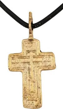FINE EASTERN EUROPEAN CHRISTIAN CROSS: 17th-18th century, Orthodox rite. Gilt bronze, just under 1 1/2" height plus the suspension loop. Relief decorated with raised edges and a vacant cross with five short transverse bars to the center be