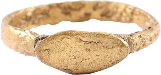 EUROPEAN CHILD'S RING, C1350-1450 SIZE 3: Gilt bronze, size 3 with well rounded face, 2.3mm width band with raised oval bezel. Professionally refurbished with the 24karat gold surface restored. Probably for child of about 5-7 years old.