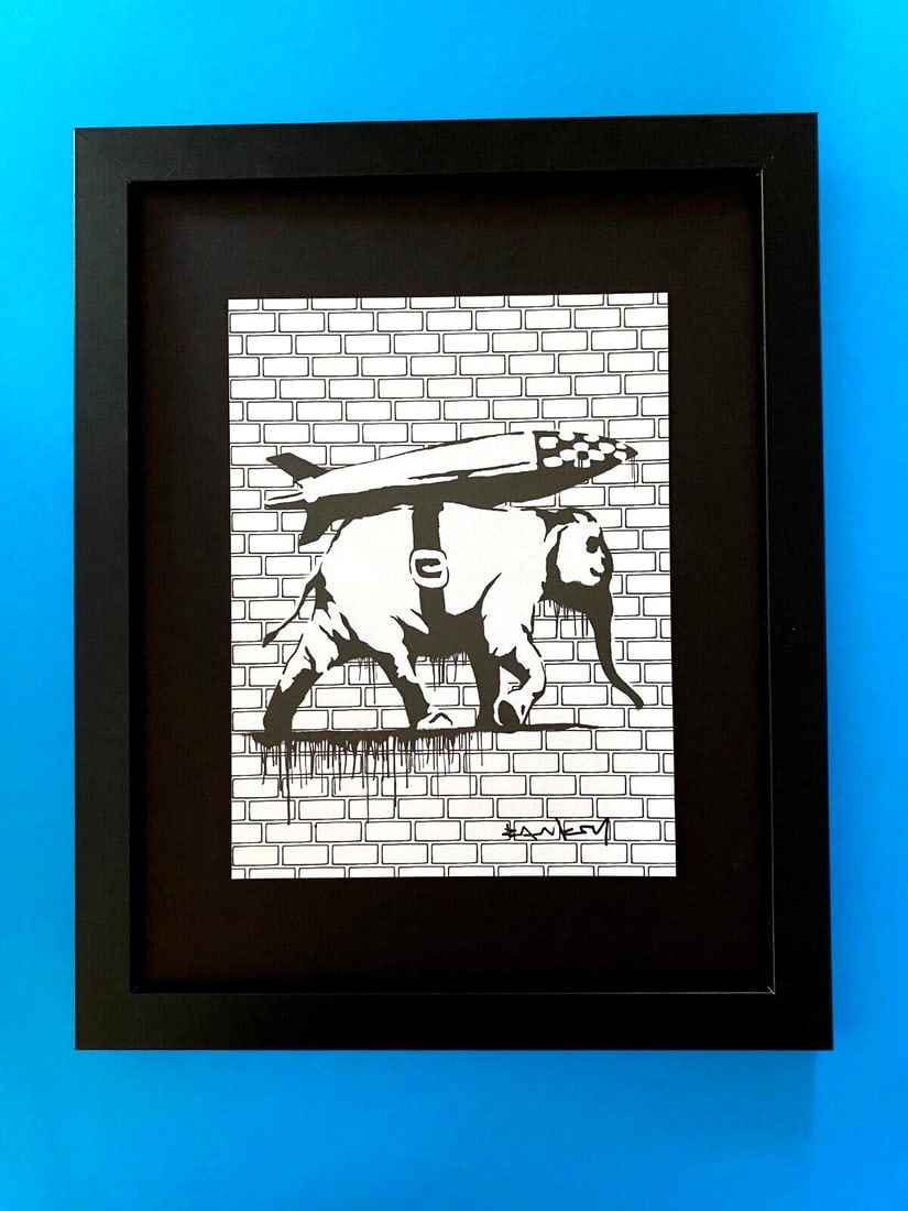 BANKSY + SIGNED GRAFFITI PRINT " ELEPHANT & MISSILE " + NEW FRAME + BUY IT NOW!: Beautiful and Scarce Print BANKSY Facsimile Signature in Ink Art Print is about 8 X 8 in. This piece is mounted on a 11 x 14 in. black acid free premium black board. Framed covers an area of 15x12in.