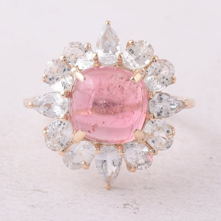 6.27 Ct Cushion Tourmaline 9K Gold Ring: 6.27 Total Carat Tourmaline 9K Gold Ring Specifications: Total Weight 3.207 g Center Gemstone Tourmaline Gemstone Carat Weight 3.53 Carats Gemstone Measurements 9X9X5 mm Additional Gemstones White Sap
