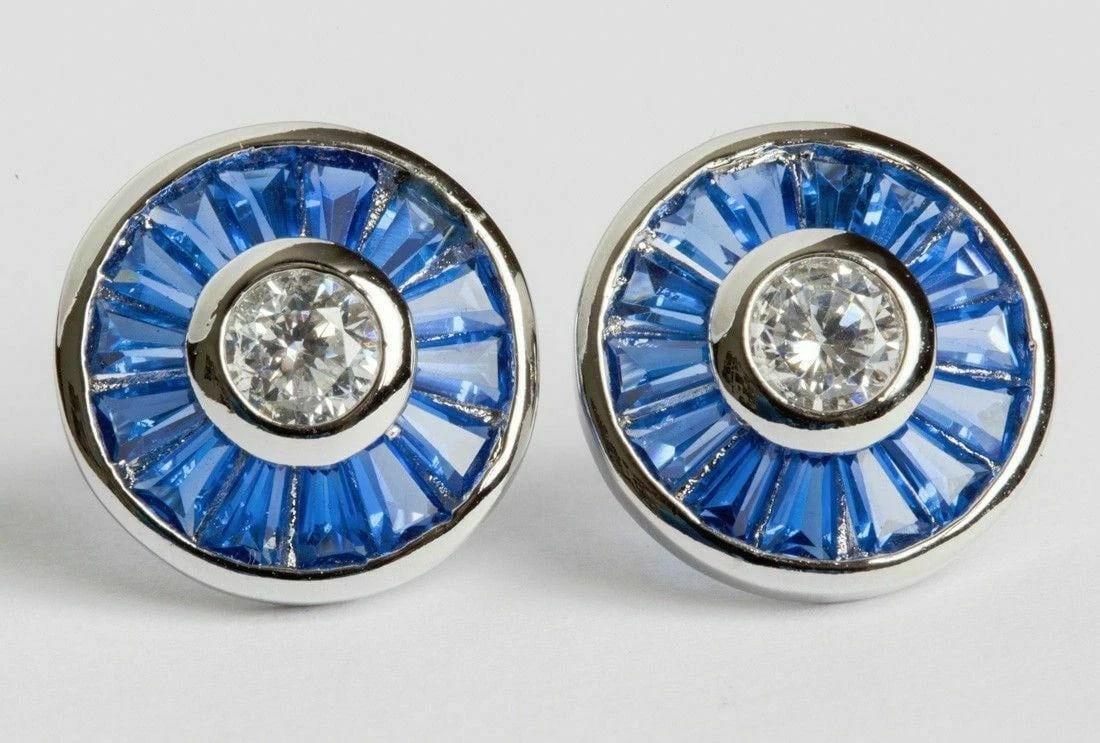 Blue Baguette and Clear Cubic Zirconia Sterling Silver Earrings: Title:Blue Baguette and Clear Cubic Zirconia Sterling Silver Earrings Description:Geometric and elegant earrings. Dead stock vintage. Circa 1980’s. Beautiful geometry created by colored cubic