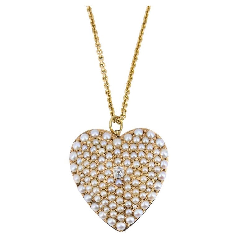 Vintage 14k Gold Diamond Pearl Heart Pendant Necklace: Title: Vintage 14k Gold Diamond Pearl Heart Pendant Necklace Description: This antique heart pendant necklace is a romantic treasure from the Victorian era, circa 1880-1900. Originally crafted as a lo