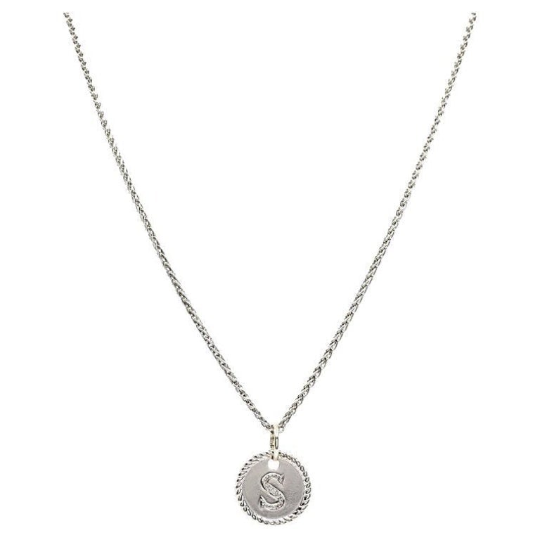 18k White Gold Monogram "S" Pendant Necklace: Title: 18k White Gold Monogram "S" Pendant Necklace Description: Elegant 18K white gold necklace featuring a twisted chain and a round, monogrammed "S" pendant bordered with a classic rope design. Thi