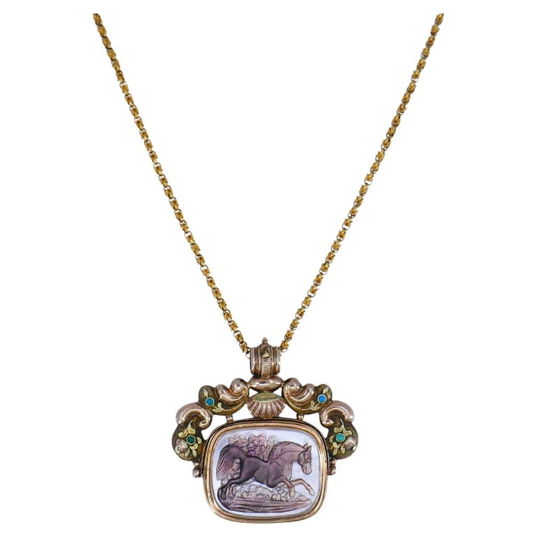 Antique Victorian Gold Mother of Pearl Equestrian Pendant Chain Necklace: Title: Antique Victorian Gold Mother of Pearl Equestrian Pendant Chain Necklace Description: This antique pendant necklace combines intricate artistry with substantial gold weight, making it both a we