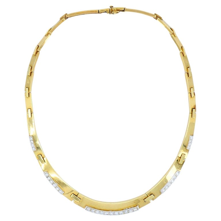 Vintage 14k Two-tone Gold Diamond Necklace: Title: Vintage 14k Two-tone Gold Diamond Necklace Description: This vintage necklace, crafted in the late 1980s to early 1990s, embodies the bold and refined aesthetic of the era. Made in 14k