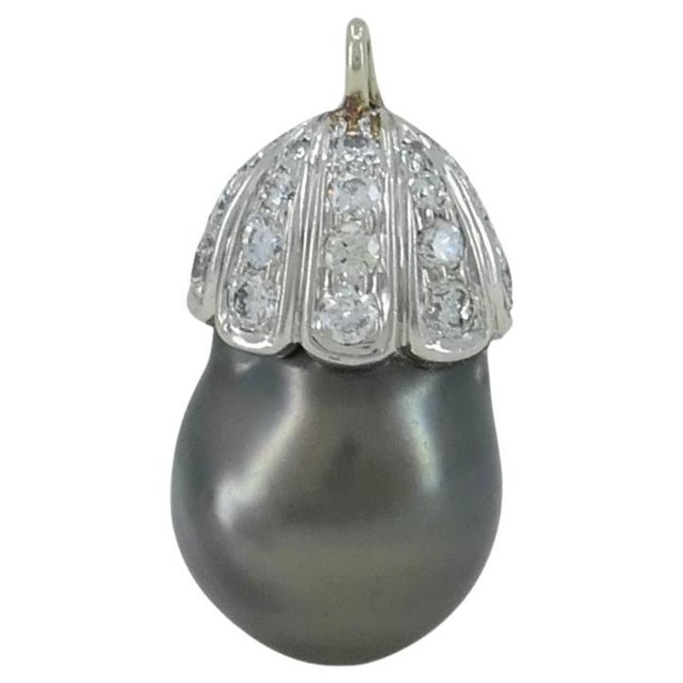 14k White Gold Tahitian Pearl Diamond Necklace Enhancer Pendant: Title: 14k White Gold Tahitian Pearl Diamond Necklace Enhancer Pendant Description: This 14k white gold Tahitian pearl necklace enhancer pendant combines timeless design with versatile wear. The