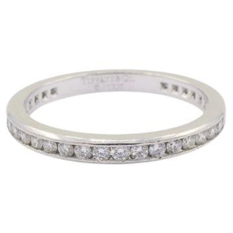 Vintage Tiffany & Co. Diamond Eternity Band Platinum Size 6: Title: Vintage Tiffany & Co. Diamond Eternity Band Platinum Size 6 Description: This vintage Tiffany & Co. eternity band ring is crafted in platinum and set with a single row of round brilliant cut