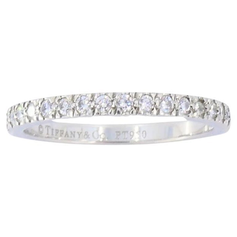 Vintage Tiffany & Co. Diamond Band Platinum Size 5.5 (51): Title: Vintage Tiffany & Co. Diamond Band Platinum Size 5.5 (51) Description: This classic Tiffany & Co. band ring is made of platinum and set with a row of round brilliant-cut diamonds. The diamonds